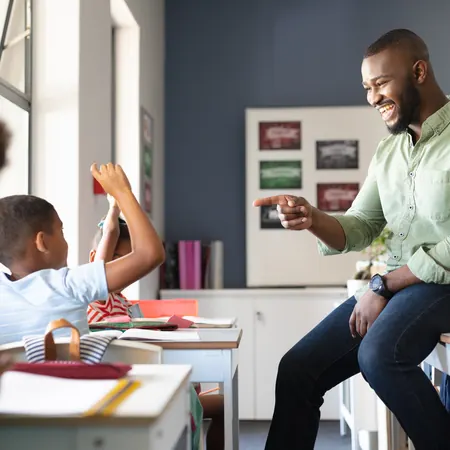 A teacher engaging with students