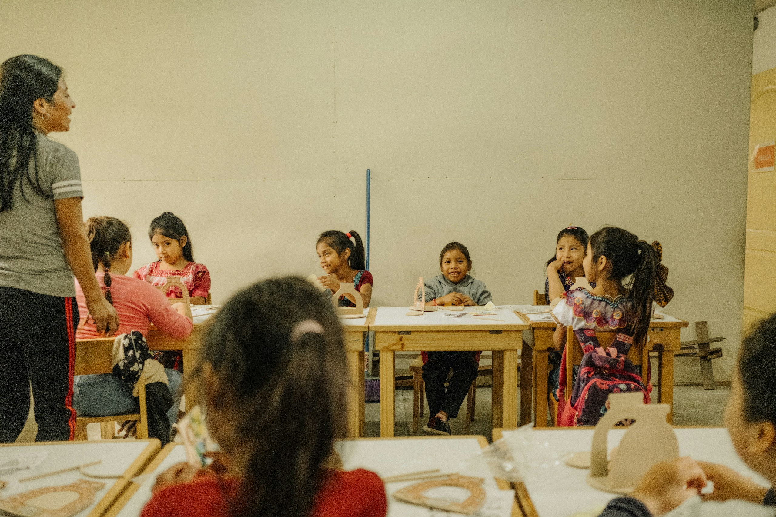 Children learning together in a classroom